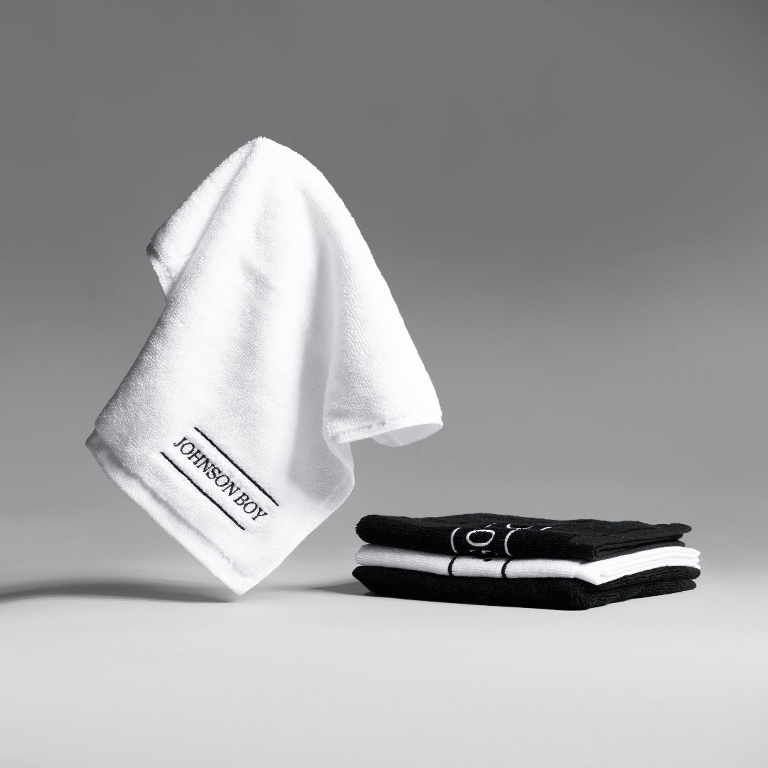 Bed Locker ultra absorbent towels folded in black and white